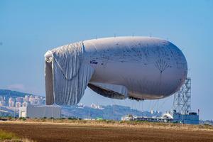 GIVAT AVNI, ISRAEL - NOVEMBER 3, 2021: Israel's deffence force launches a massive reconnaissance surveillance balloon to detect aerial threats at long