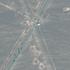 A satellite image shows new vehicle revetments and trucks on the road 1.1 kilometres from the Fordow nuclear facility, near Qom