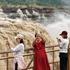 YAN AN, CHINA - SEPTEMBER 20: The water volume of the Hukou Waterfall on the Yellow River increases significantly due to