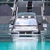 CHENGDU, CHINA - AUGUST 31: BYD YangWang U8 plug-in hybrid SUV demonstrates its emergency floating function during Cheng