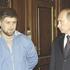 Vladimir Putin meets Ramzan Kadyrov in 2004.