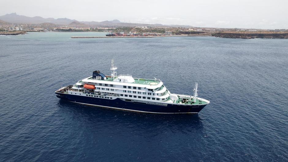 A drone view of the cruise ship MV Hondius, carrying passengers suspected of having cases of hantavirus on board, as it prepares to leave Praia | Author: Danilson Sequeira/REUTERS