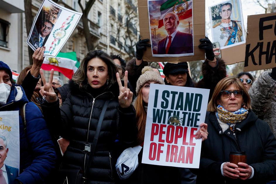 Demonstrators and activists rally in Paris in support of nationwide protests in Iran