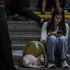 People take shelter during a Russian missile and drone strike, amid Russia's attack on Ukraine, in Kyiv