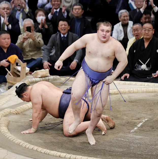 Ukrainian sumo wrestler sekiwake Aonishiki, his real name Danylo Yavhusishyn, beats yokozuna Hoshoryu to win the Emperor's Cup sumo tournament in Fukuoka