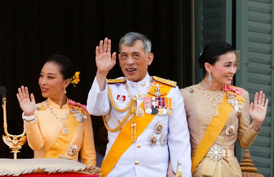 FILE PHOTO: Thailand's King Maha Vajiralongkorn, Queen Suthida and Princess Bajrakitiyabha wave from the balcony of Suddhaisavarya Prasad Hall at the Grand Palace
