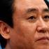 FILE PHOTO: China Evergrande Group Chairman Hui Ka Yan attends a news conference on the property developer's annual results in Hong Kong