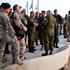 Senior military commanders and officers from around the world observe Gaza from Israel as part of an international seminar, in Sderot