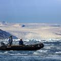 Tourists exploring the Kangerlussuaq Fjord in zodiac, Southeast coast, Greenland