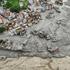 A drone view shows mud covering properties following a flash flood in Trishuli