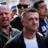 London, UK. 13th Sep, 2025. Tommy Robinson and his security march with the crowd past the Houses of Parliament for the Unite The Kingdom march in the city. A counter-demonstration was also organised by Stand Up To Racism, which saw 16000 police officers d