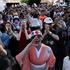 Supporters of Japan's Sanseito party leader react during the party’s rally in Tokyo